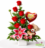 Arreglo de rosas rojas con peluche Siempre Tuyo, presentación romántica ideal para regalar.