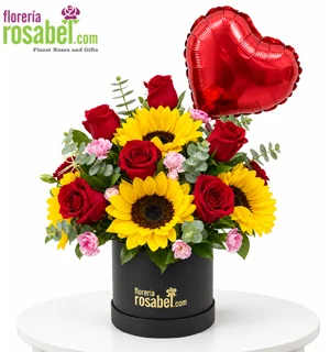 Box de girasoles y rosas rojas con claveles y globo corazón
